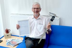 Brian Wycherley showing our ISO 9001 Certification