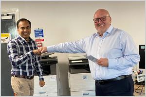 Phil Green and Sukhjinder Singh Fist Bumping